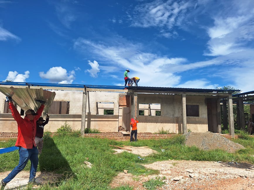 Construction contractor working on solar roof replacement project on-site